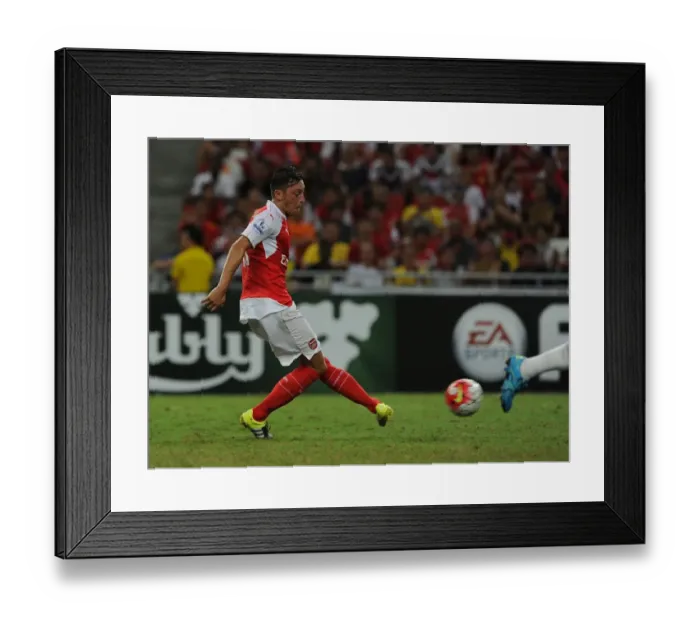 Framed Print : Mesut Ozil Scores His Third Goal: Arsenal Triumphs Over Everton in 2015 Asia Trophy Match