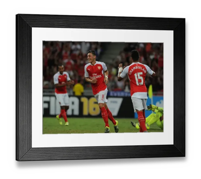 Framed Print : Mesut Ozil Scores His Third Goal: Arsenal's Victory at 2015-16 Barclays Asia Trophy vs Everton, Singapore Framed Print : Mesut Ozil Scores His Third Goal: Arsenal's Victory at 2015-16 Barclays Asia Trophy vs Everton, Singapore