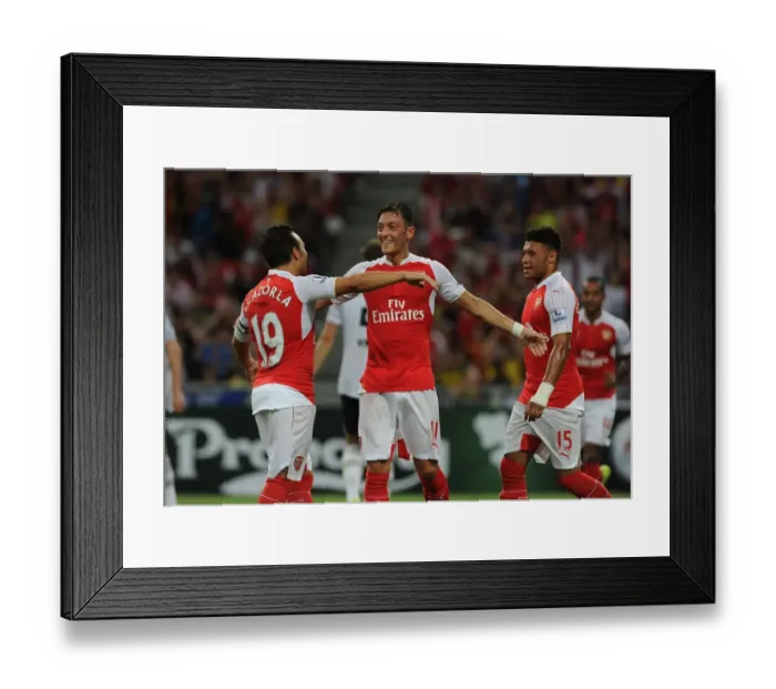 Framed Print : Arsenal's Mesut Ozil Scores Decisive Goal Against Everton in Barclays Asia Trophy Framed Print : Arsenal's Mesut Ozil Scores Decisive Goal Against Everton in Barclays Asia Trophy