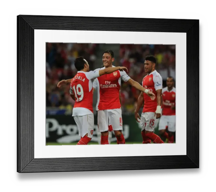 Framed Print : Mesut Ozil's Decisive Goal: Arsenal Defeats Everton in Barclays Asia Trophy Framed Print : Mesut Ozil's Decisive Goal: Arsenal Defeats Everton in Barclays Asia Trophy