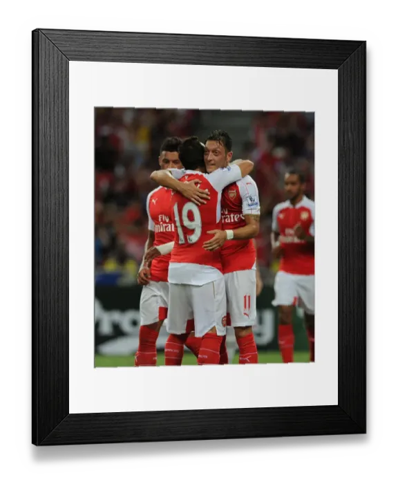 Framed Print : Arsenal's Ozil Scores Hat-Trick: Arsenal Triumphs Over Everton in Barclays Asia Trophy Framed Print : Arsenal's Ozil Scores Hat-Trick: Arsenal Triumphs Over Everton in Barclays Asia Trophy