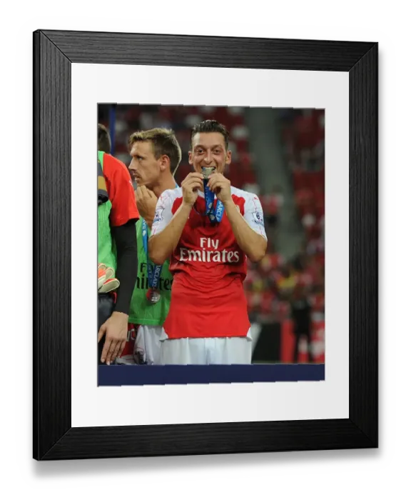 Framed Print : Arsenal's Mesut Ozil Leads the Team to Asia Trophy Victory over Everton Framed Print : Arsenal's Mesut Ozil Leads the Team to Asia Trophy Victory over Everton