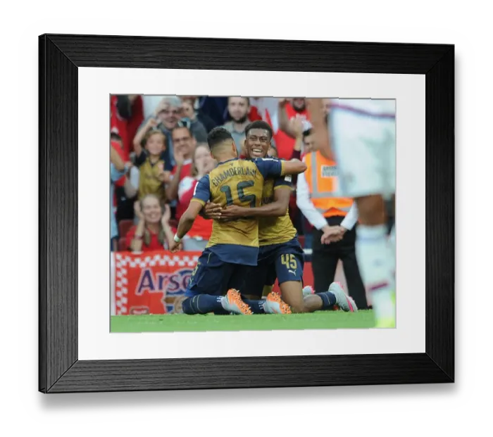 Framed Print : Arsenal's Iwobi and Oxlade-Chamberlain Celebrate Goal Against Olympique Lyonnais, Emirates Cup 2015 / 16