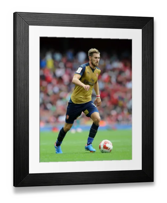 Framed Print : Arsenal's Aaron Ramsey in Action Against Olympique Lyonnais at Emirates Cup 2015 / 16 Framed Print : Arsenal's Aaron Ramsey in Action Against Olympique Lyonnais at Emirates Cup 2015 / 16