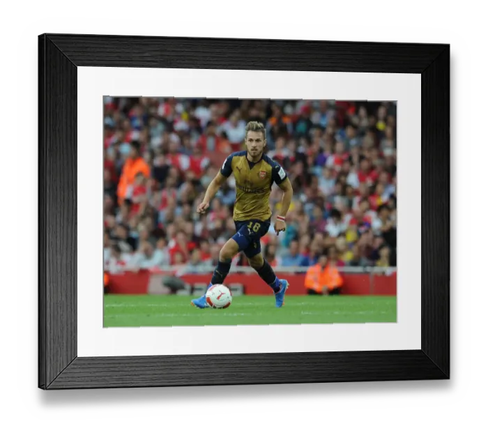Framed Print : Arsenal's Aaron Ramsey in Action Against Olympique Lyonnais at Emirates Cup 2015 Framed Print : Arsenal's Aaron Ramsey in Action Against Olympique Lyonnais at Emirates Cup 2015
