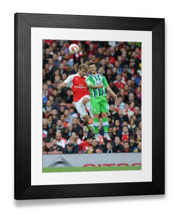 Framed Print : Monreal vs. Vieirinha: A Battle at the Emirates Cup 2015 / 16 - Arsenal vs. VfL Wolfsburg