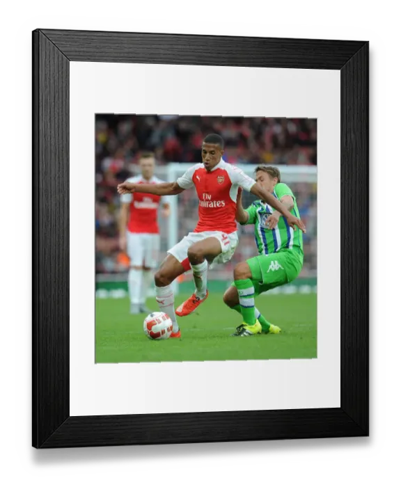Framed Print : Isaac Hayden vs. Max Kruse: A Clash at the Emirates Cup, 2015