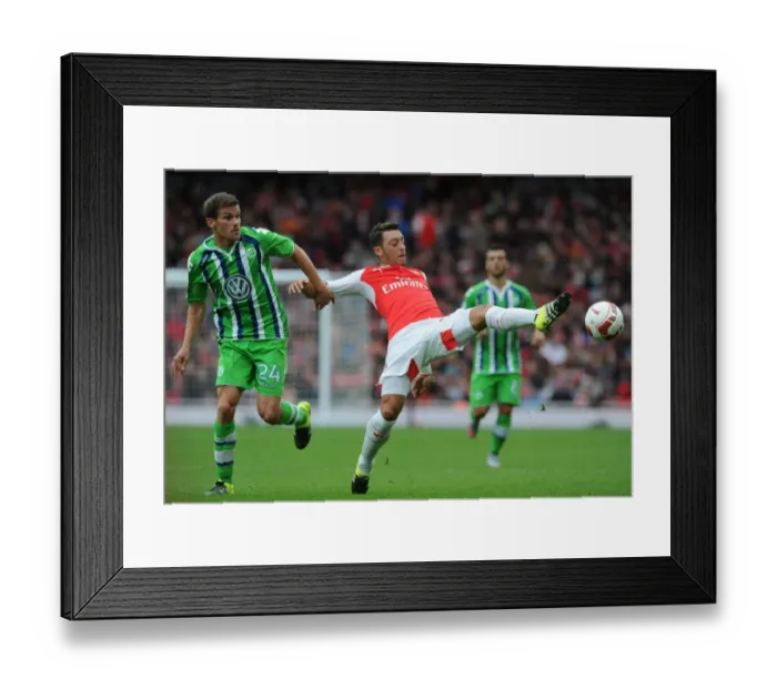 Framed Print : Mesut Ozil vs. Sebastian Jung: A Clash of Talents at the Emirates Cup 2015 / 16 Framed Print : Mesut Ozil vs. Sebastian Jung: A Clash of Talents at the Emirates Cup 2015 / 16
