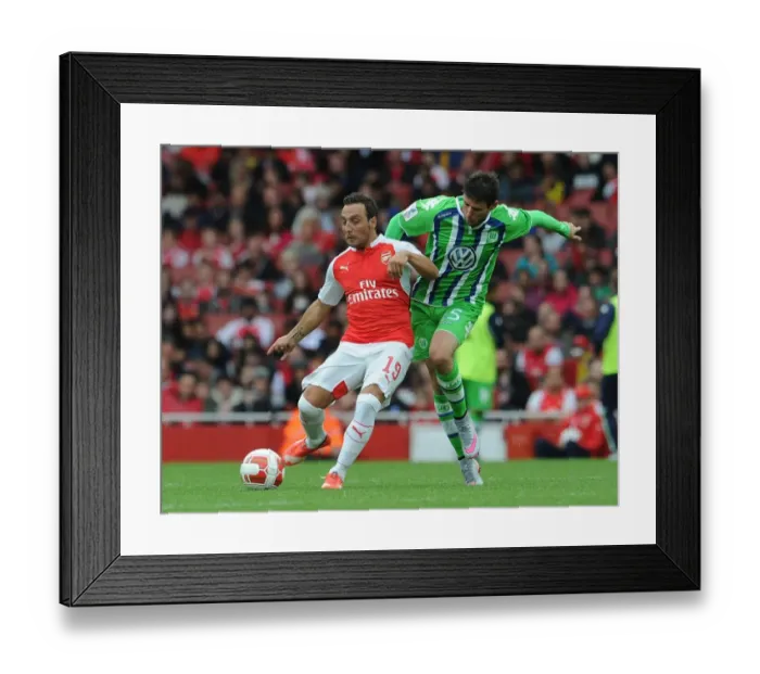 Framed Print : Santi Cazorla: Arsenal's Midfield Maestro Feels the Heat Against VfL Wolfsburg at Emirates Cup, 2015 Framed Print : Santi Cazorla: Arsenal's Midfield Maestro Feels the Heat Against VfL Wolfsburg at Emirates Cup, 2015