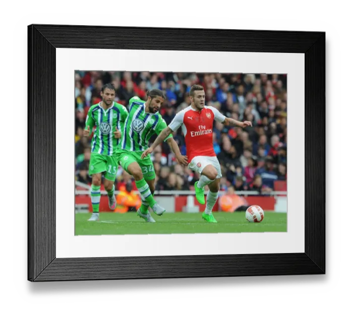 Framed Print : Arsenal's Jack Wilshere vs. Ricardo Rodriguez: A Battle at the Emirates Cup