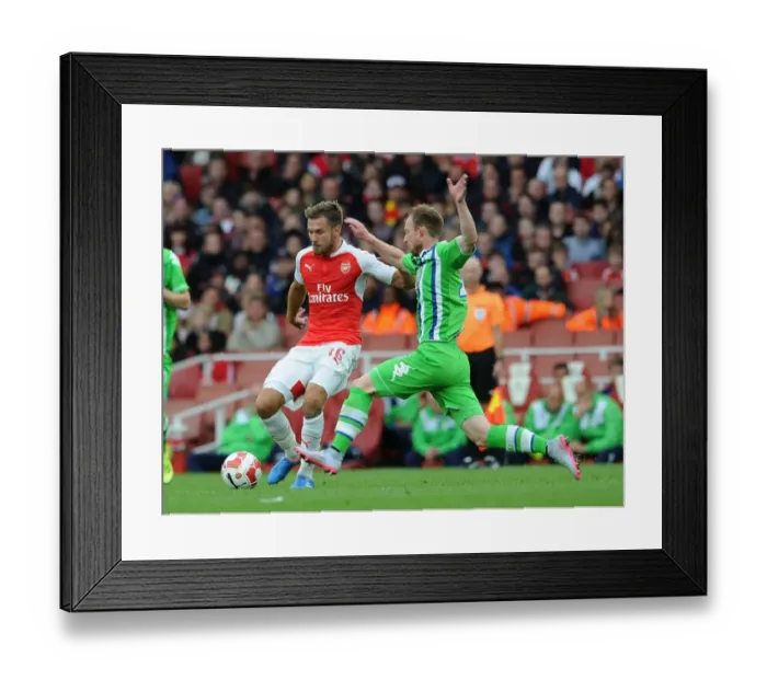 Framed Print : Arsenal vs. VfL Wolfsburg: A Tense Emirates Cup Showdown, 2015