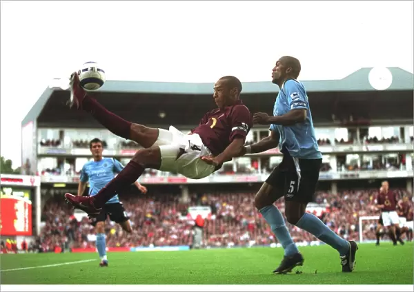 Thierry Henry vs. Sylvain Distin: Arsenal's 1-0 Victory Over Manchester City in the FA Premier League, October 2005