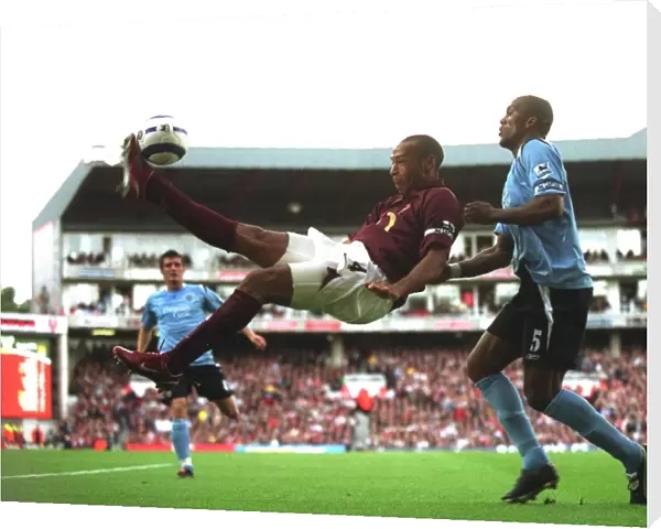 Thierry Henry vs. Sylvain Distin: Arsenal's 1-0 Victory Over Manchester City in the FA Premier League, October 2005