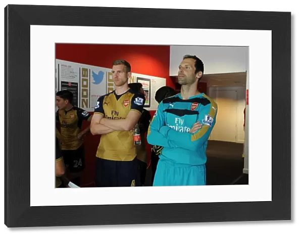 Per Mertesacker and Petr Cech (Arsenal). Arsenal 1st Team Photcall and Training Session