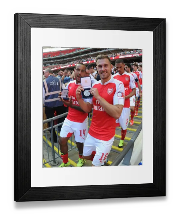 Framed Print : Arsenal's Walcott and Ramsey Celebrate Community Shield Victory over Chelsea