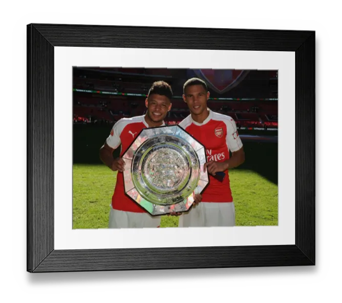 Framed Print : Arsenal's Oxlade-Chamberlain and Gibbs Celebrate after Community Shield Victory over Chelsea Framed Print : Arsenal's Oxlade-Chamberlain and Gibbs Celebrate after Community Shield Victory over Chelsea