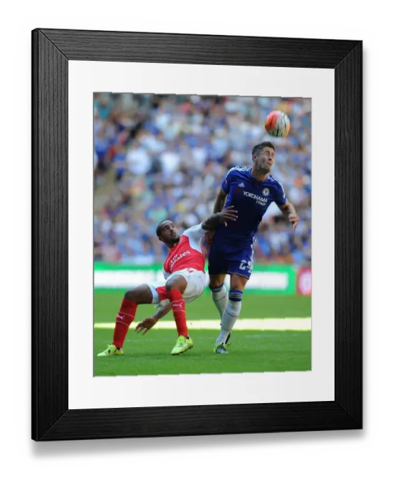 Framed Print : Theo Walcott vs. Gary Cahill: A Rivalry Ignites at the 2015 Community Shield - Arsenal vs. Chelsea