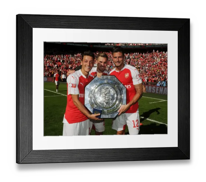 Framed Print : Arsenal Triumph in Community Shield: Ozil, Ramsey, Giroud Celebrate Victory over Chelsea Framed Print : Arsenal Triumph in Community Shield: Ozil, Ramsey, Giroud Celebrate Victory over Chelsea
