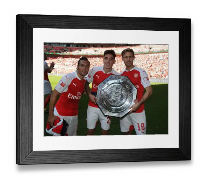 Framed Print : Arsenal Celebrate FA Community Shield Victory over Chelsea (2015): Santi Cazorla, Hector Bellerin, and Nacho Monreal Rejoice Framed Print : Arsenal Celebrate FA Community Shield Victory over Chelsea (2015): Santi Cazorla, Hector Bellerin, and Nacho Monreal Rejoice