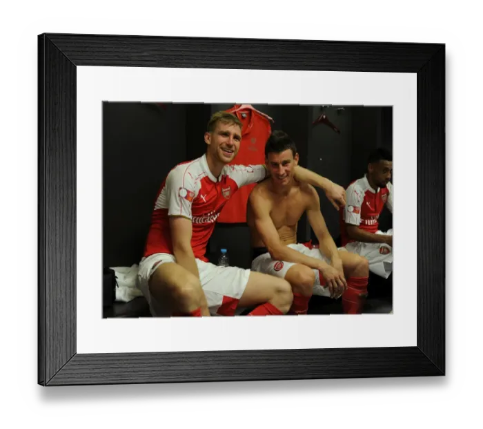 Framed Print : Arsenal's Per Mertesacker and Laurent Koscielny Celebrate Community Shield Victory over Chelsea Framed Print : Arsenal's Per Mertesacker and Laurent Koscielny Celebrate Community Shield Victory over Chelsea