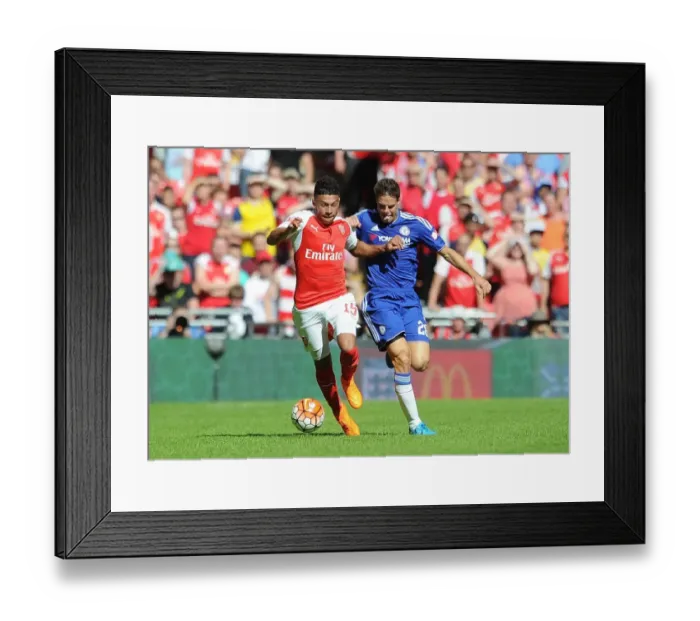 Framed Print : Clash at Wembley: Oxlade-Chamberlain vs Azpilicueta - Battle for Midfield Supremacy Framed Print : Clash at Wembley: Oxlade-Chamberlain vs Azpilicueta - Battle for Midfield Supremacy