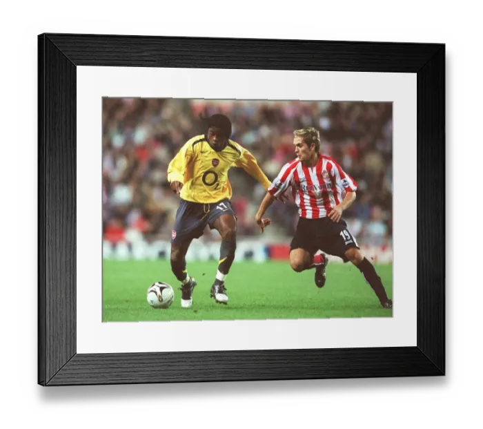 Framed Print : Alex Song's Dominance: Arsenal's 3-0 Carling League Cup Victory Over Sunderland (2005)