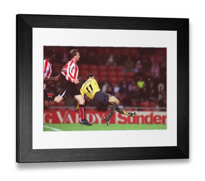 Framed Print : Robin van Persie scores Arsenals 3rd goal his 2nd under pressure from Steven Caldwell Framed Print : Robin van Persie scores Arsenals 3rd goal his 2nd under pressure from Steven Caldwell