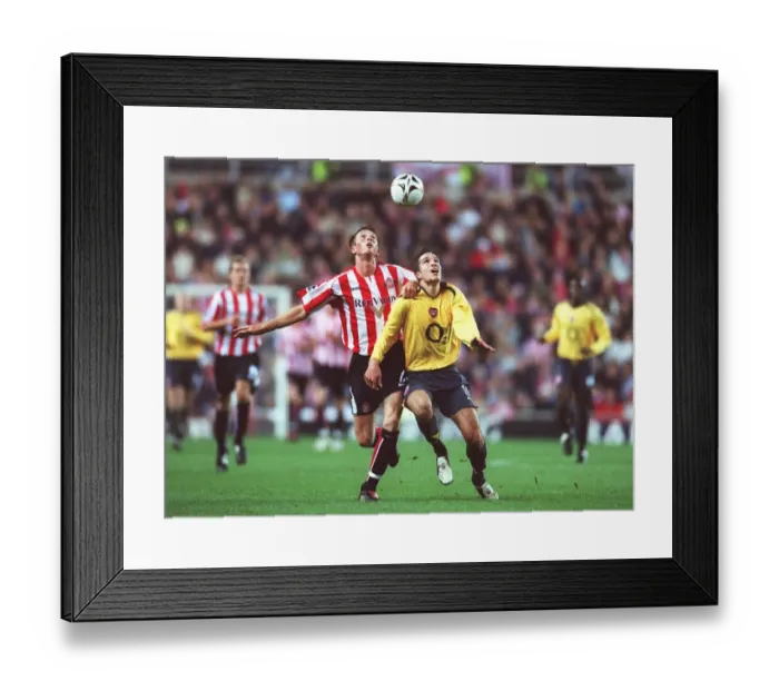 Framed Print : Robin van Persie (Arsenal) Danny Collins (Sunderland). Sunderland 0: 3 Arsenal Framed Print : Robin van Persie (Arsenal) Danny Collins (Sunderland). Sunderland 0: 3 Arsenal