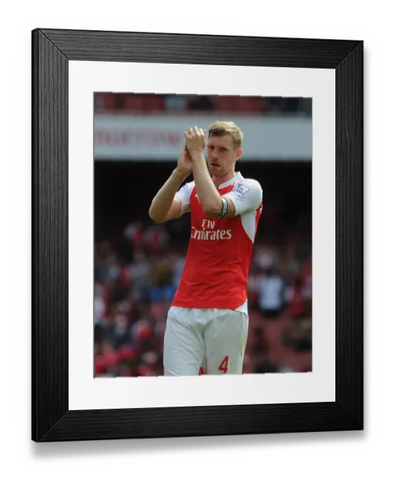 Framed Print : Per Mertesacker: Deep in Thought After Arsenal's Battle Against West Ham United (2015-16) Framed Print : Per Mertesacker: Deep in Thought After Arsenal's Battle Against West Ham United (2015-16)
