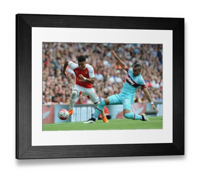 Framed Print : Oxlade-Chamberlain vs. Payet: A Premier League Rivalry Ignites - Arsenal vs. West Ham Showdown