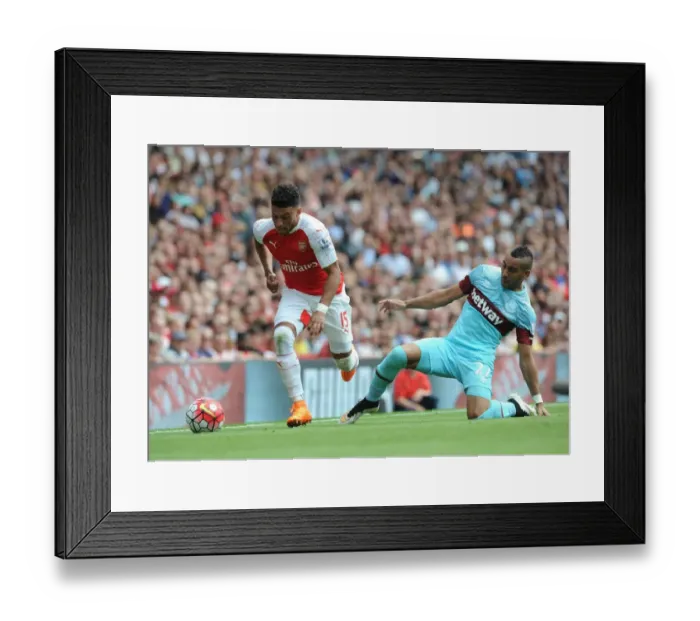 Framed Print : Clash of Stars: Oxlade-Chamberlain vs. Payet in Premier League Battle