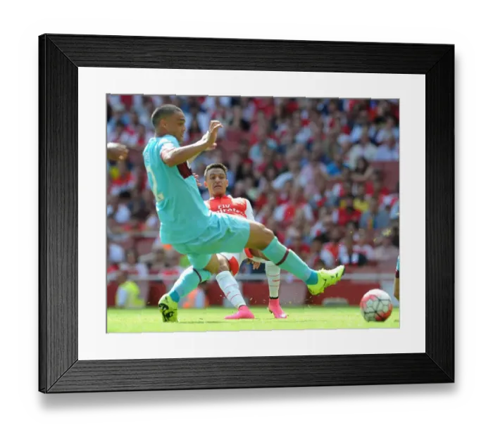 Framed Print : Clash of Titans: Alexis Sanchez vs. Winston Reid in Intense Arsenal-West Ham Battle