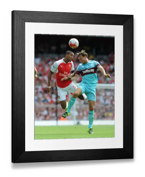 Framed Print : Theo Walcott vs Mark Noble: A Premier League Showdown
