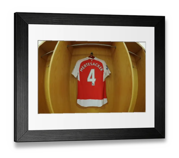 Framed Print : Per Mertesacker (Arsenal) kit. Arsenal 0: 2 West Ham United. Barclays Premier League