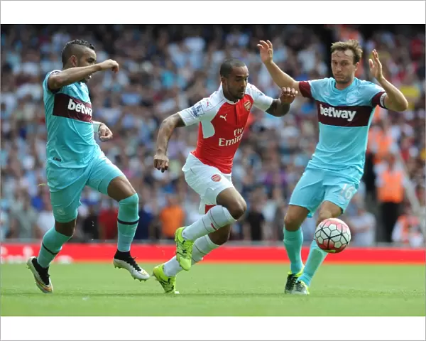 Theo Walcott (Arsenal) Dimitri Payet and Mark Noble (West Ham). Arsenal 0: 2 West