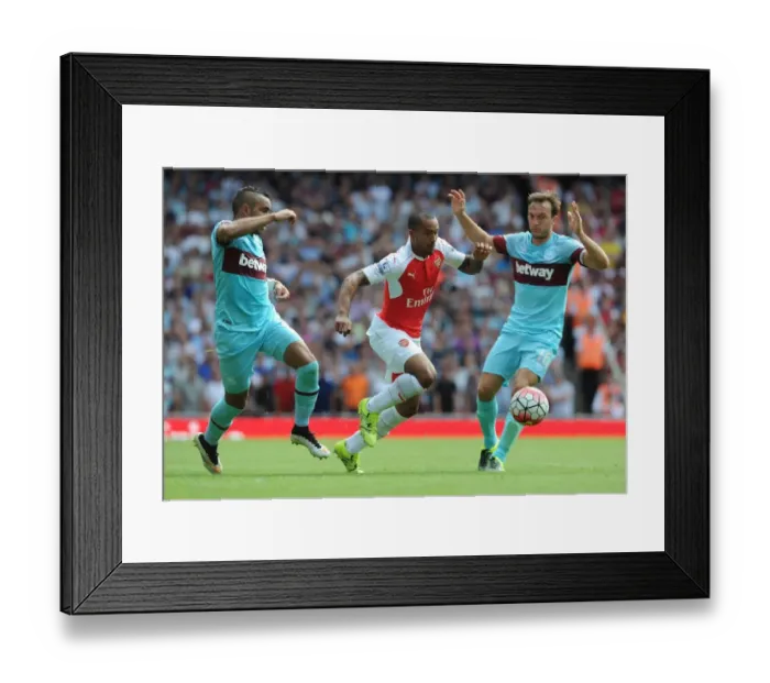 Framed Print : Theo Walcott (Arsenal) Dimitri Payet and Mark Noble (West Ham). Arsenal 0: 2 West Framed Print : Theo Walcott (Arsenal) Dimitri Payet and Mark Noble (West Ham). Arsenal 0: 2 West