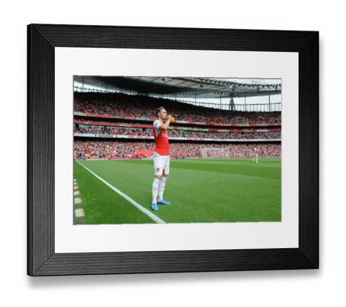 Framed Print : Aaron Ramsey (Arsenal). Arsenal 0: 2 West Ham United. Barclays Premier League. Emirates
