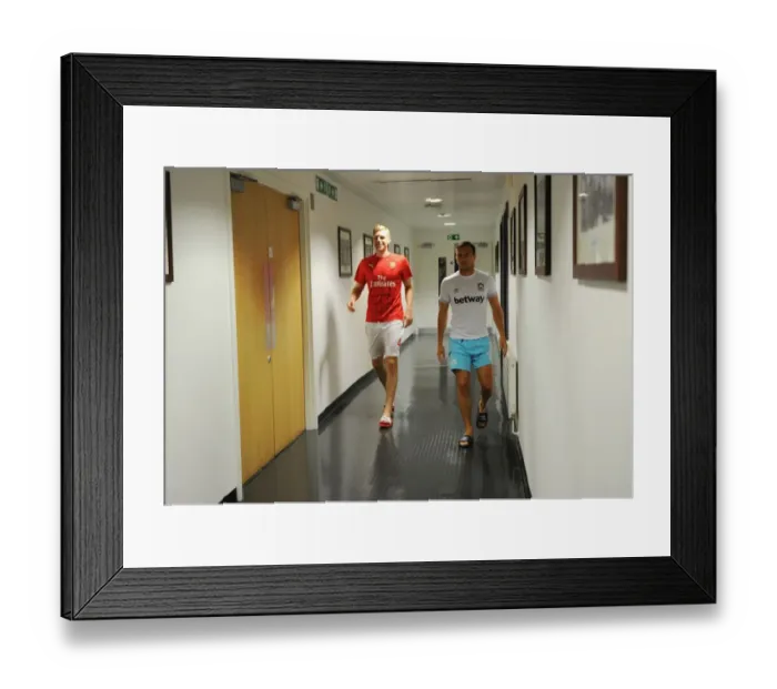 Framed Print : Arsenal vs. West Ham United: 2015-16 Premier League Showdown - Captains Face-off at Emirates Stadium Framed Print : Arsenal vs. West Ham United: 2015-16 Premier League Showdown - Captains Face-off at Emirates Stadium