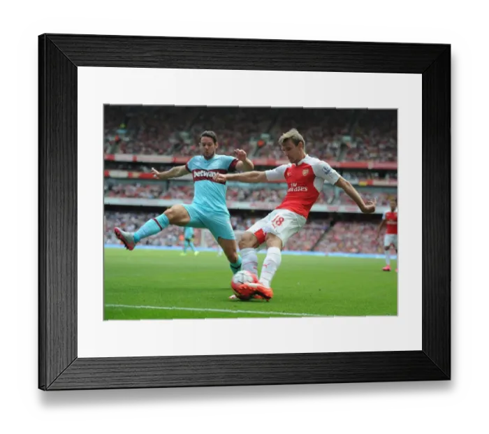 Framed Print : Monreal vs. Jarvis: A Football Battle at Emirates - Arsenal vs. West Ham United (2015-16)