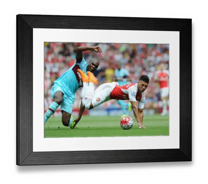 Framed Print : Oxlade-Chamberlain vs. Ogbonna: A Premier League Showdown at Emirates Stadium Framed Print : Oxlade-Chamberlain vs. Ogbonna: A Premier League Showdown at Emirates Stadium