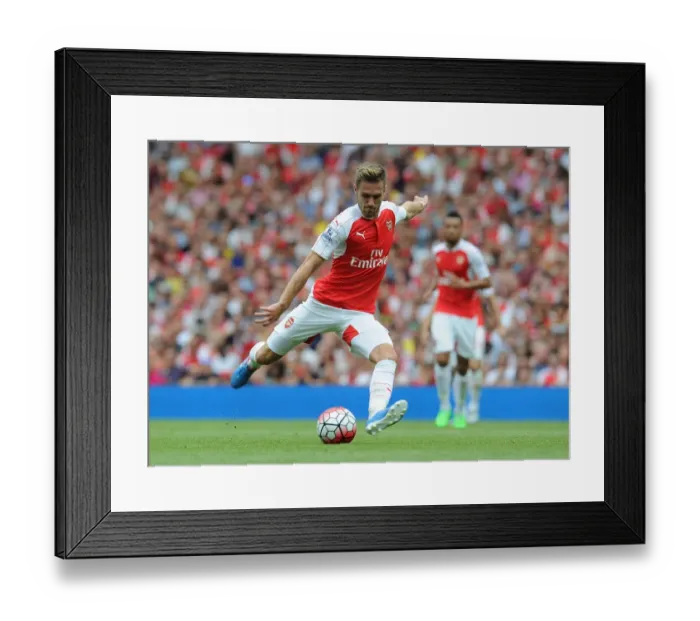 Framed Print : Arsenal's Aaron Ramsey in Action Against West Ham United (2015-16 Premier League) Framed Print : Arsenal's Aaron Ramsey in Action Against West Ham United (2015-16 Premier League)