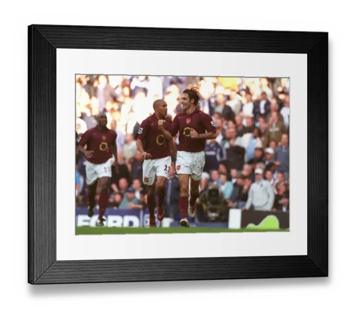 Framed Print : Robert Pires celebrates scoring the Arsenal goal with Gael Clichy