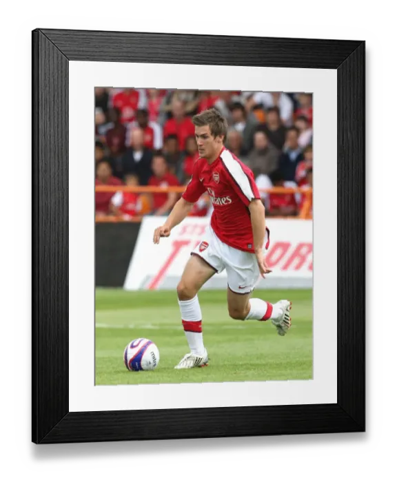 Framed Print : Arsenal's Pre-Season Triumph: Aaron Ramsey's Debut (2-1) Against Barnet, 2008