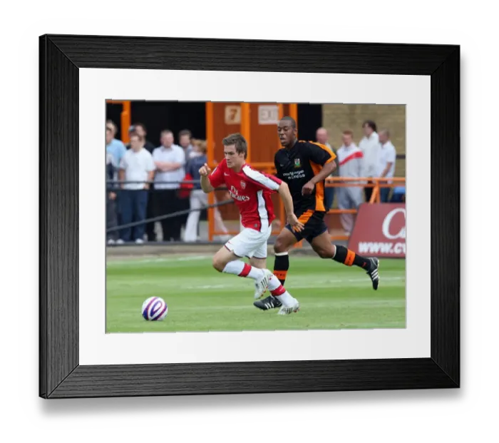 Framed Print : Aaron Ramsey (Arsenal) Cliff Akurang (Barnet)