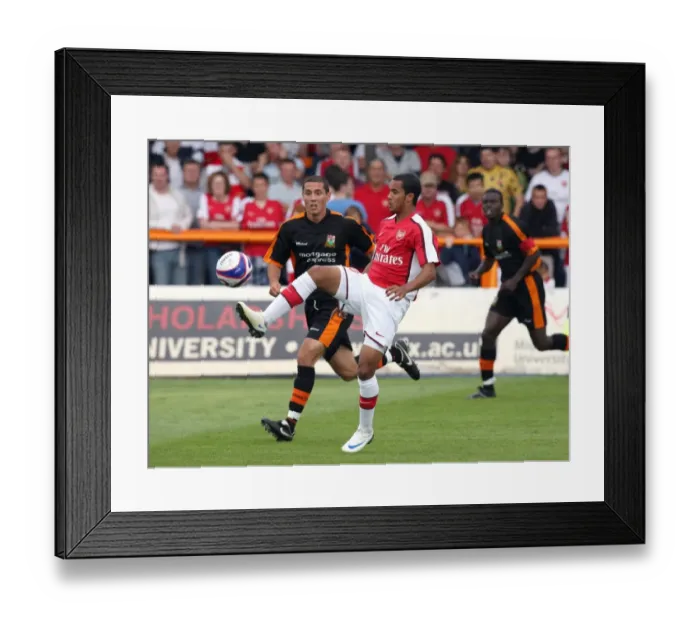 Framed Print : Theo Walcott (Arsenal) Joe Devera (Barnet)