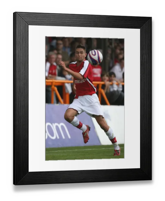 Framed Print : Henry Lansbury: Scoring the Difference for Arsenal in Barnet's 1-2 Defeat (2008)