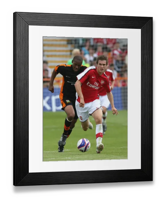 Framed Print : Arsenal's Aaron Ramsey Dazzles in Pre-Season Debut: Arsenal Triumph Over Barnet 2-1, 2008 Framed Print : Arsenal's Aaron Ramsey Dazzles in Pre-Season Debut: Arsenal Triumph Over Barnet 2-1, 2008