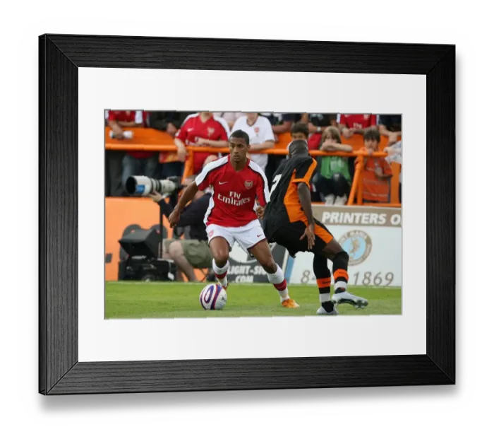Framed Print : Armand Traore (Arsenal) Albert Adomah (Barnet) Framed Print : Armand Traore (Arsenal) Albert Adomah (Barnet)