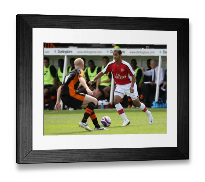 Framed Print : Theo Walcott (Arsenal) Neal Bishop (Barnet) Framed Print : Theo Walcott (Arsenal) Neal Bishop (Barnet)