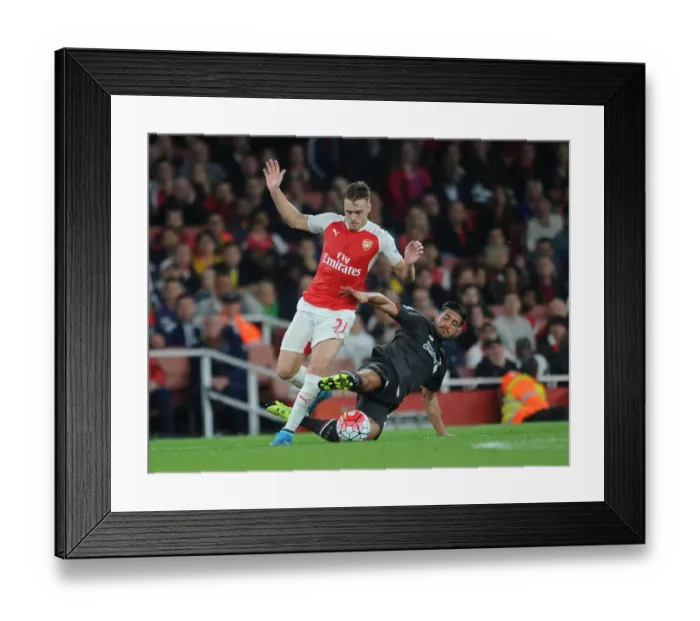 Framed Print : Clash of Titans: Arsenal vs. Liverpool - Battle for the Premier League